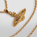 Vivienne Westwood Crystal Bas-Relief gold necklace with crystal detailing on chain
