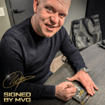 Michael van Gerwen signing MVG Evo-X darts with autograph